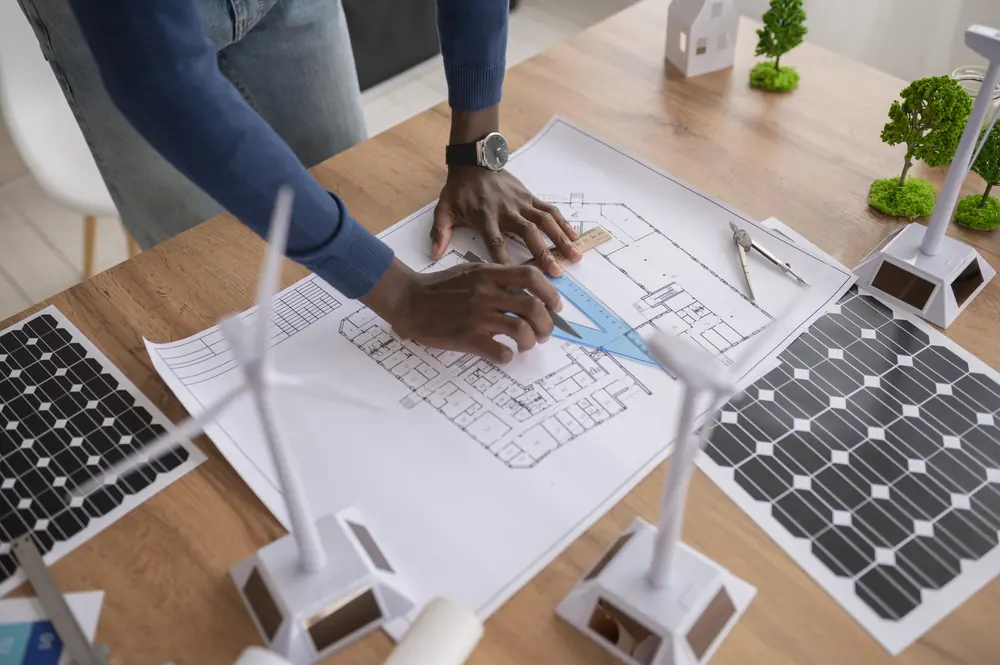 House plan design blueprint on desk